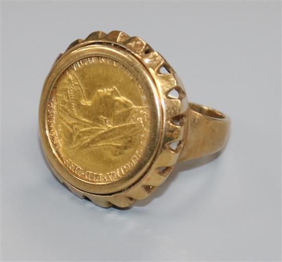 A 9ct gold ring set with a 1901 half sovereign